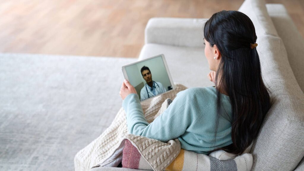 Woman on video call with Doctor