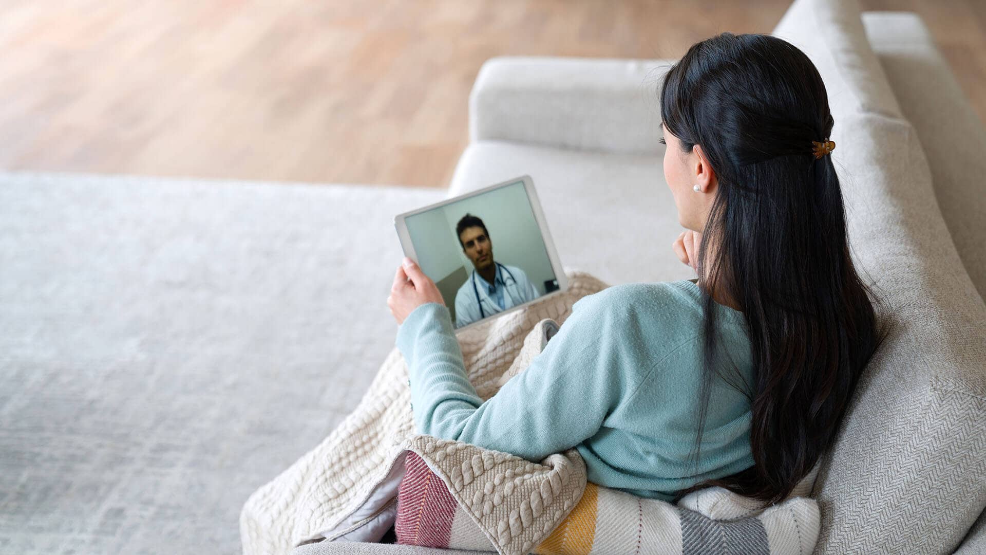 Woman on video call with Doctor