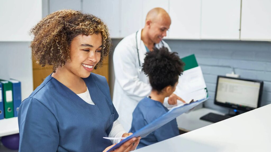 Nurse looking at chart