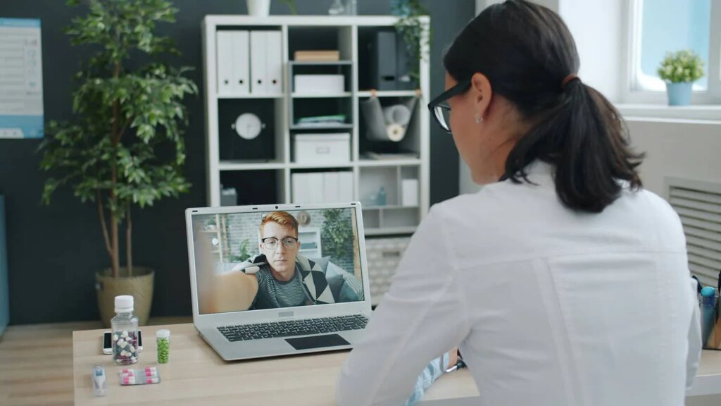Doctor on video call with patient